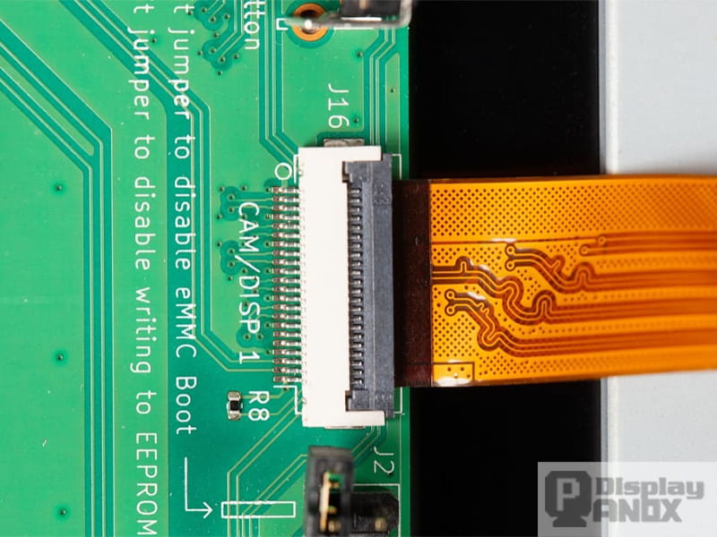 Close-up of a 7-inch display FPC cable connected to the display controller board.