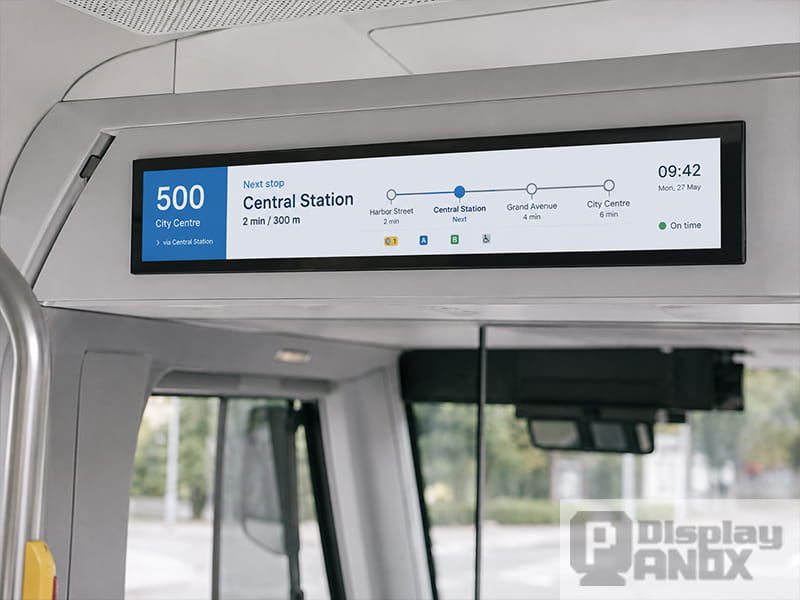 Long strip display used as a public transport information screen showing route and next stop details